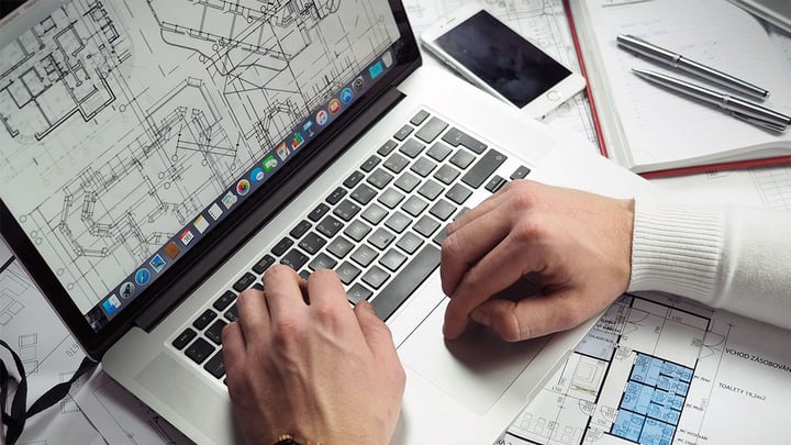 Architect Drafting Initial Building Blueprints